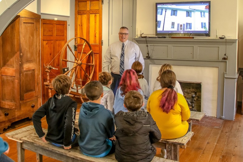 PCPS Superintendent Dr. Kevin Siers tells students about the history of Newbern.